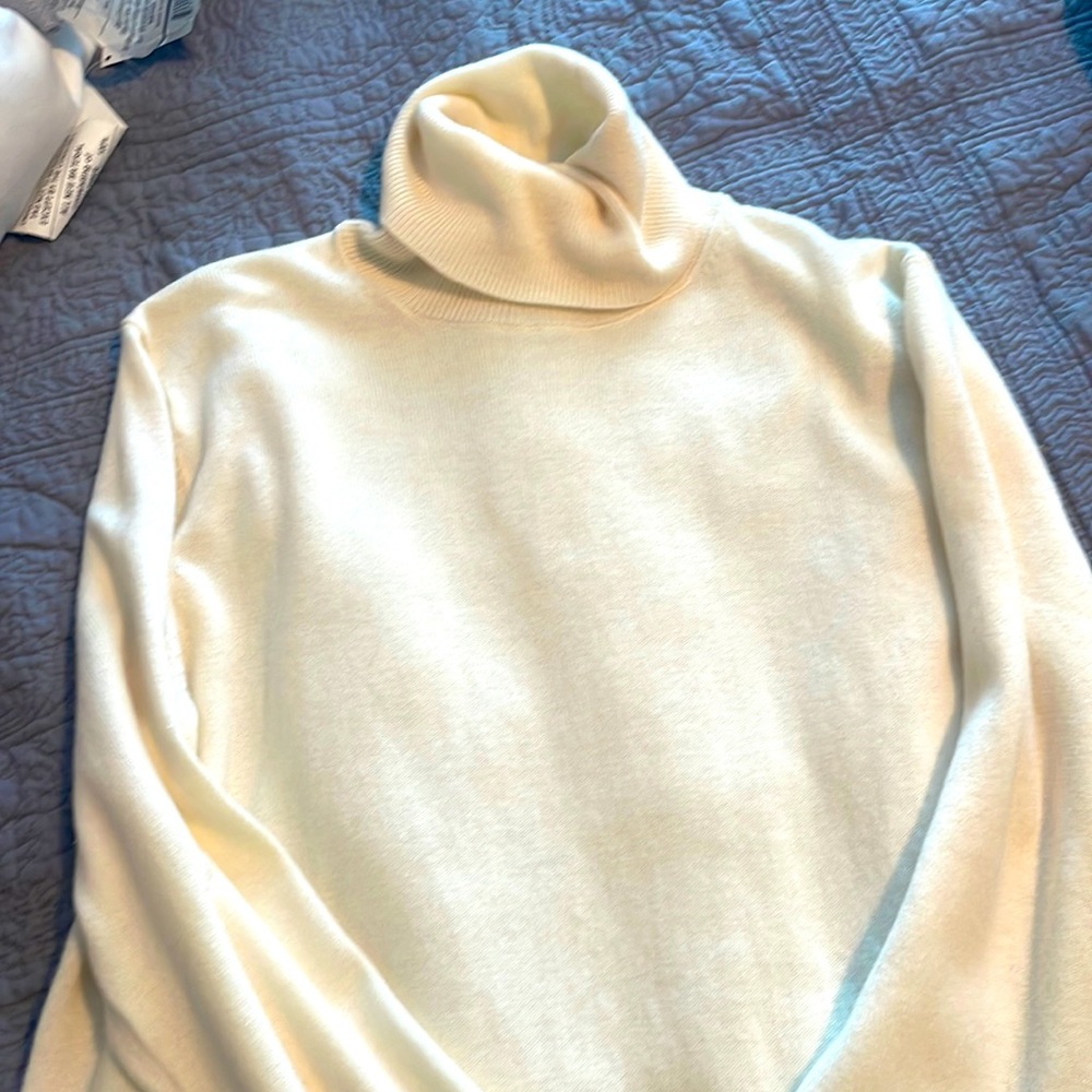 Cute cream turtleneck.